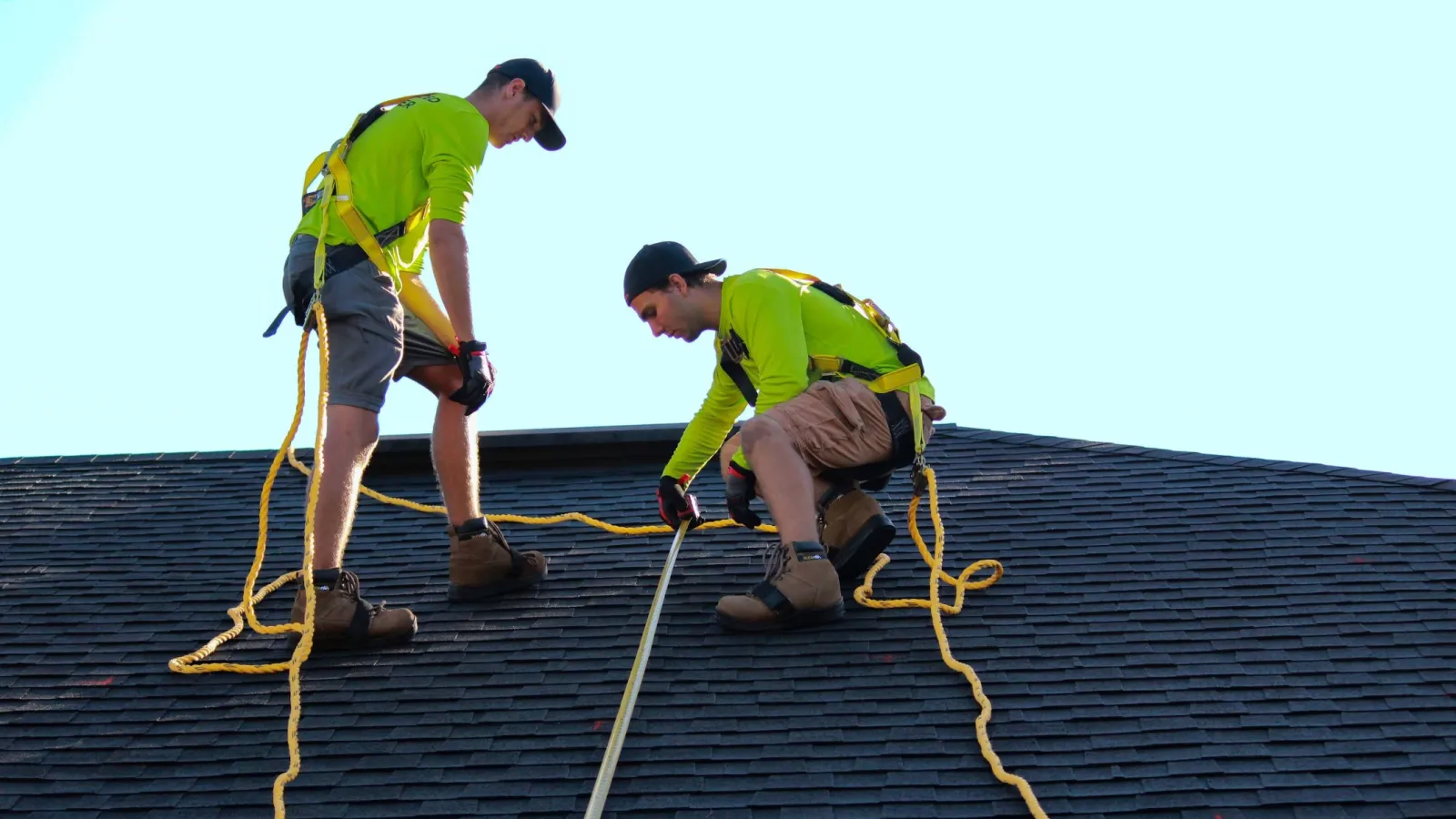 men working on a roof