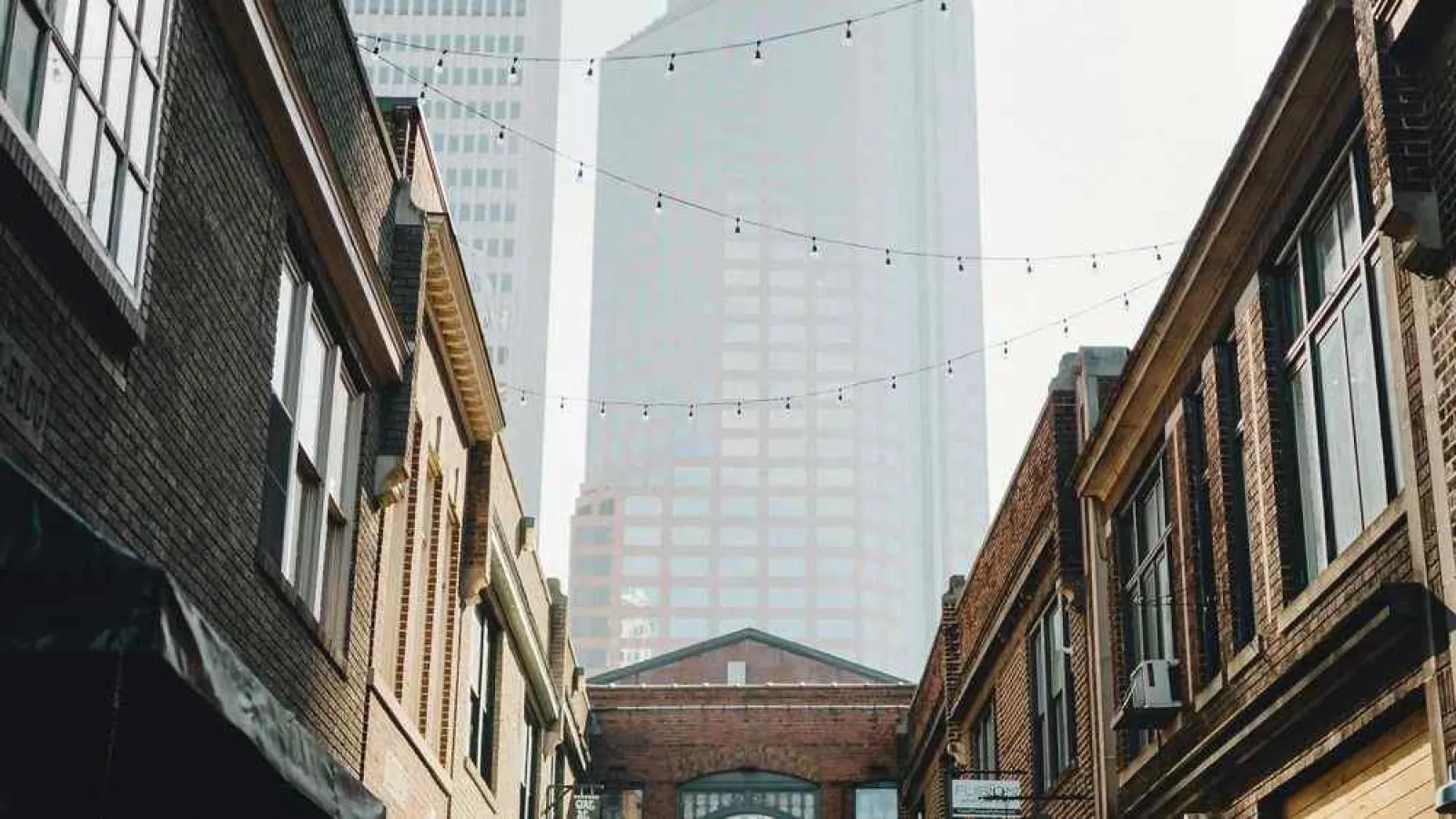 a tall building with a glass front