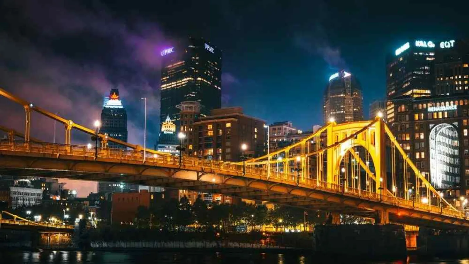 a bridge with lights at night