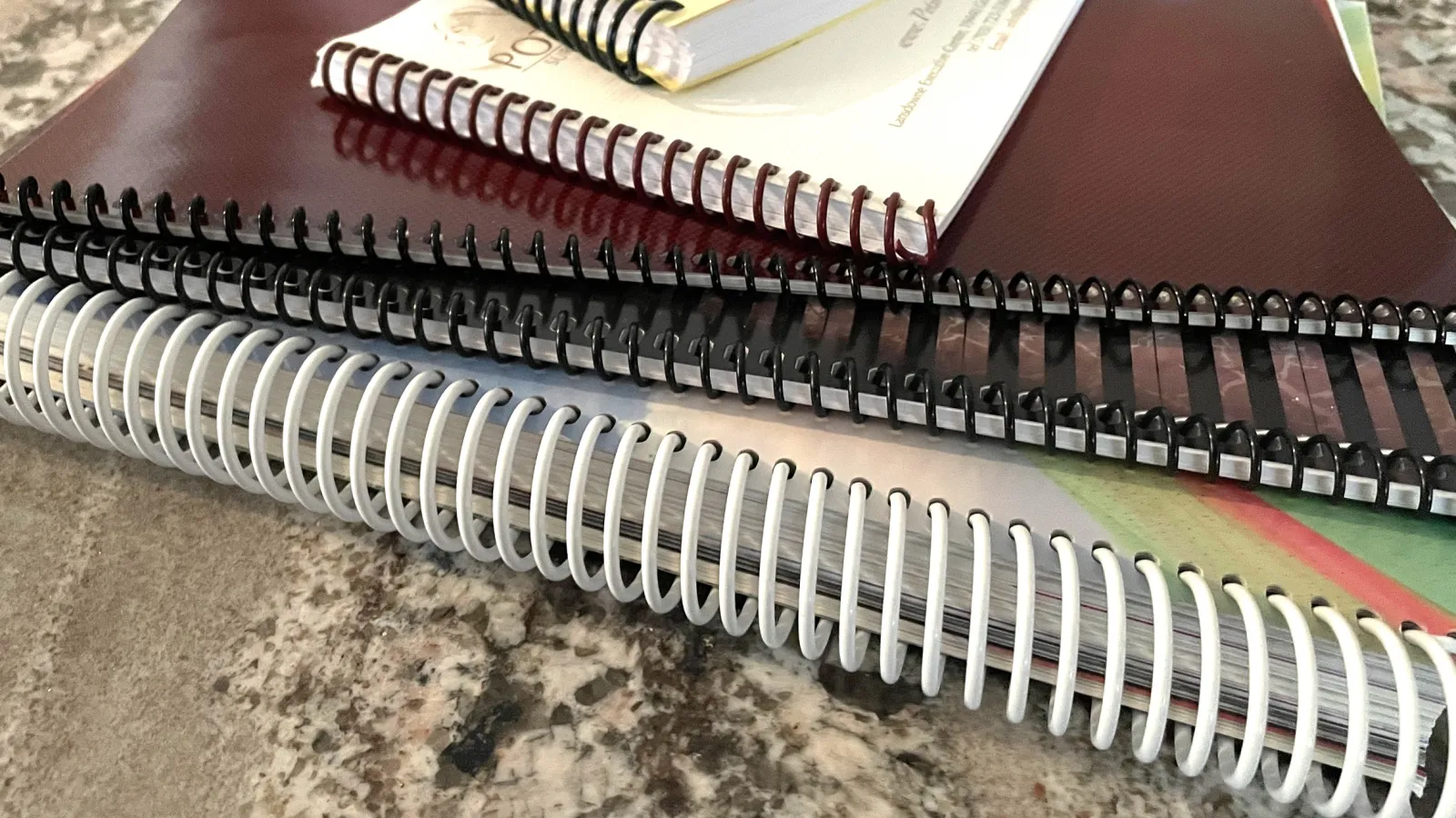 Stack of Books with Spiral Binding