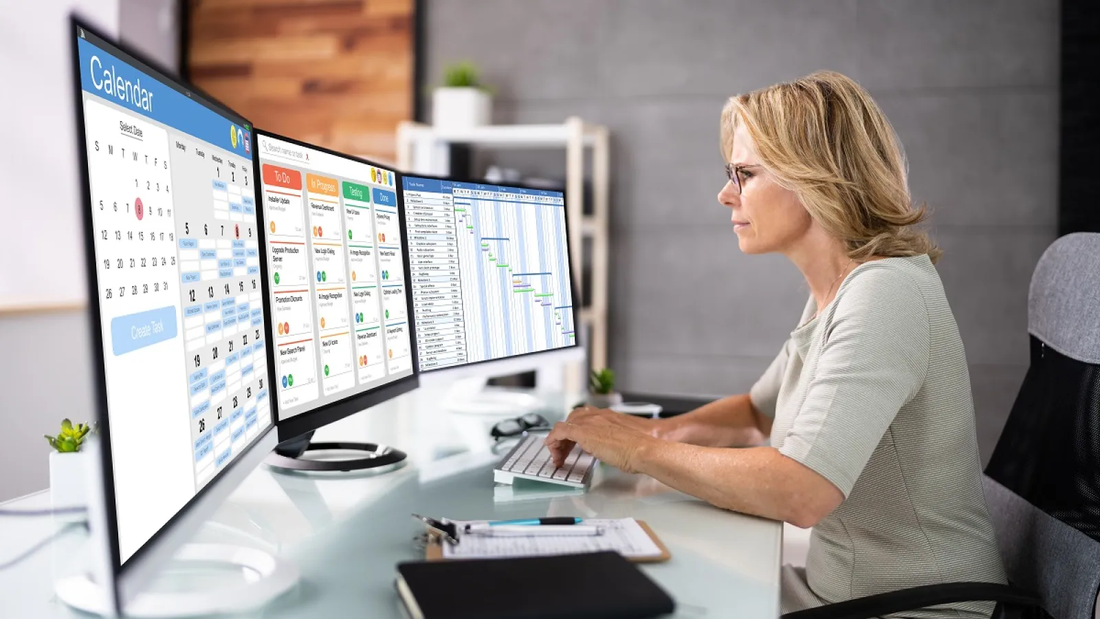 A woman Scheduling a Print Project on a Computer