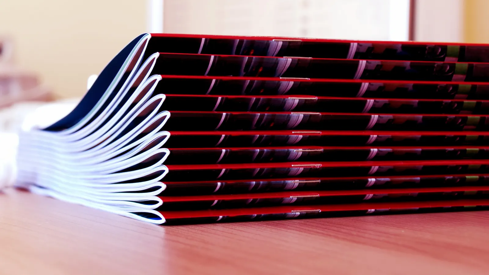 A stack of Saddle-Stitched Booklets