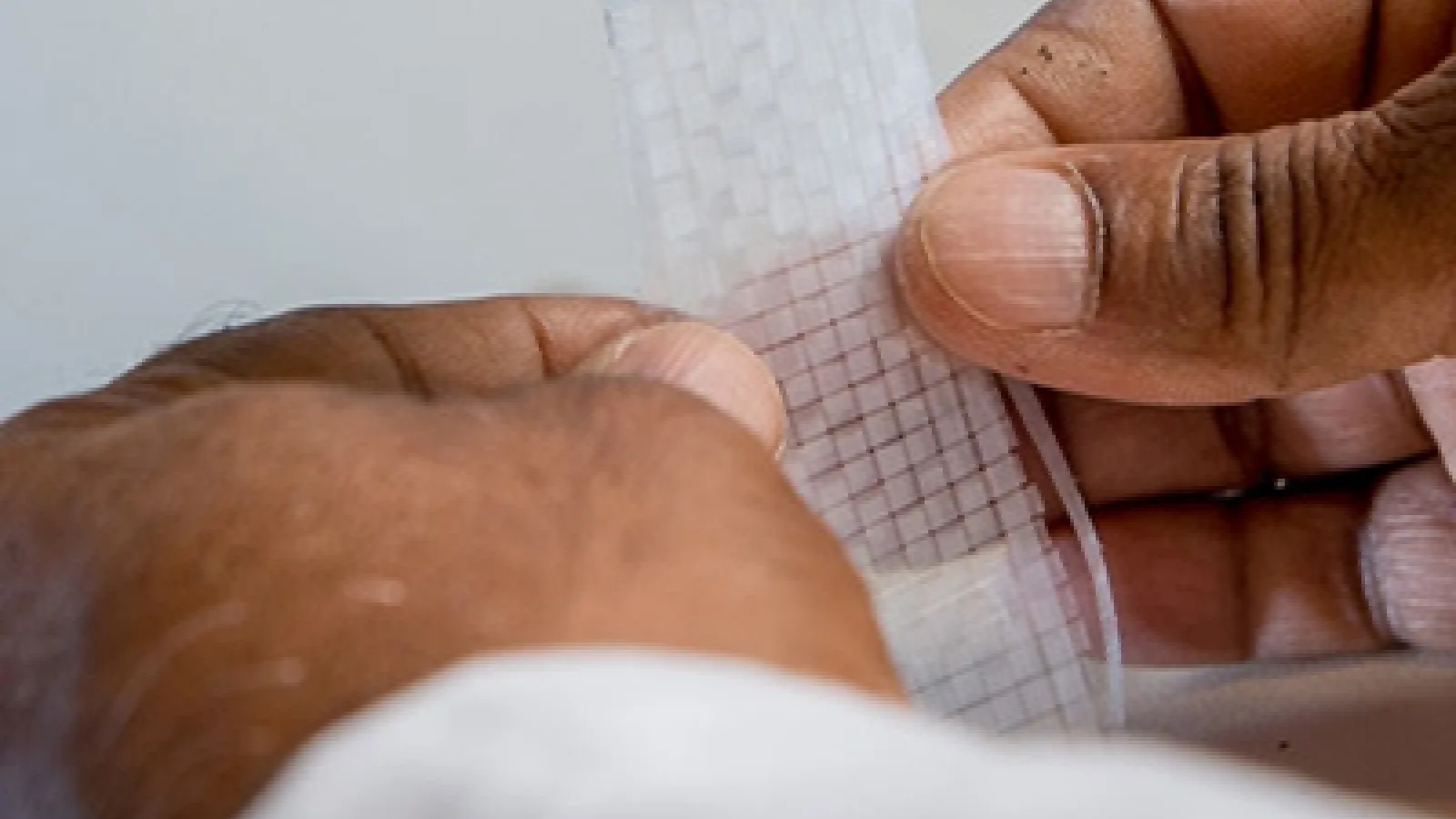 a person holding a piece of paper