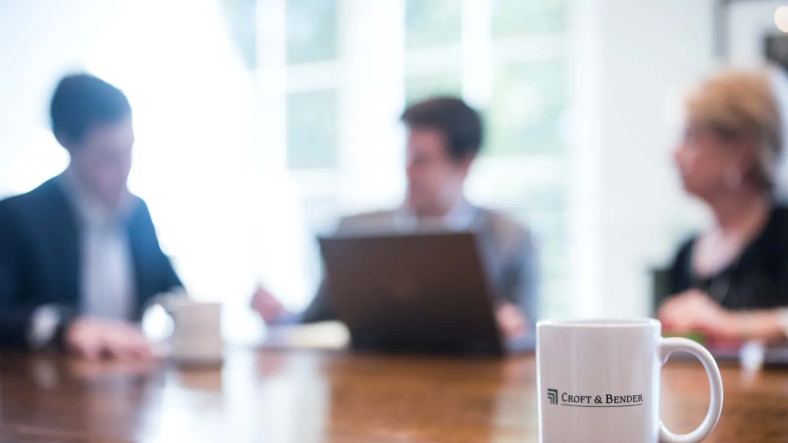 a few people sitting at a table