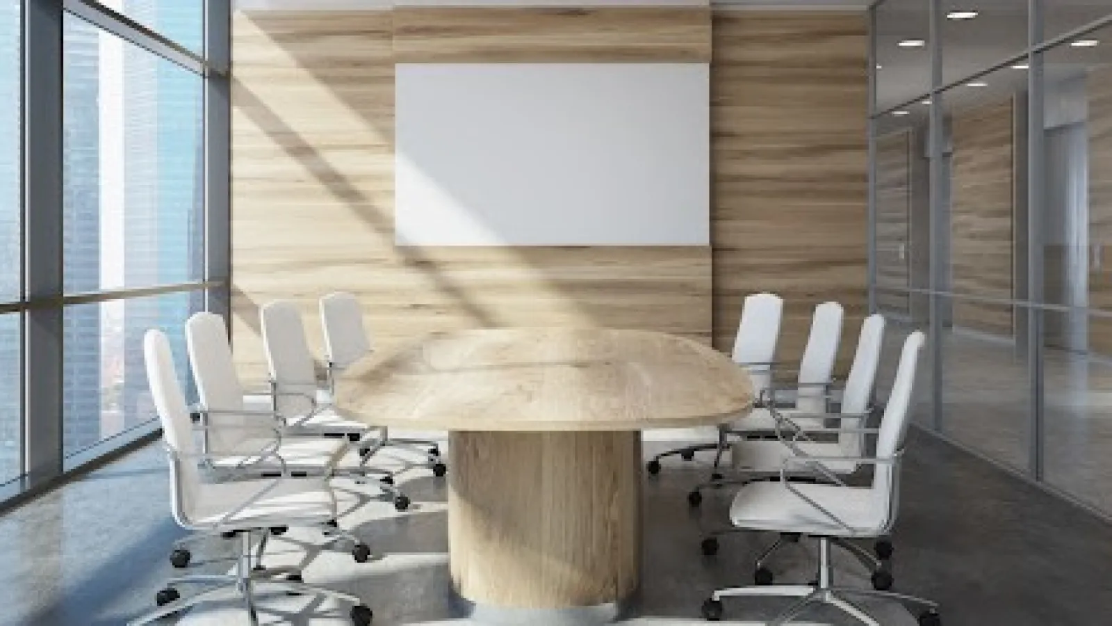a conference room with a table and chairs