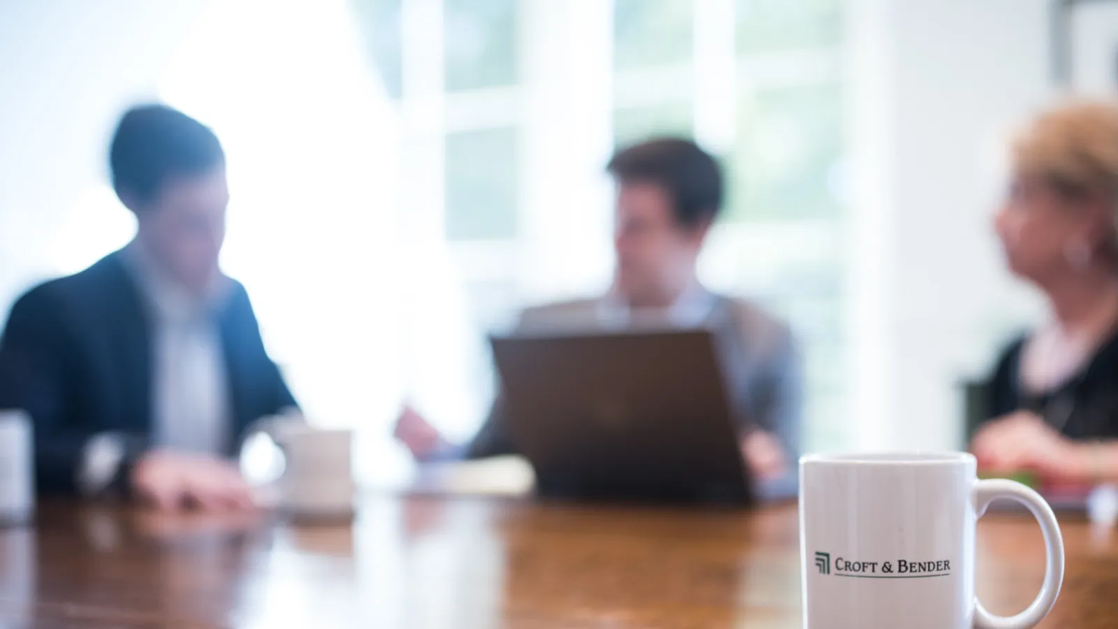 a few people sitting at a table