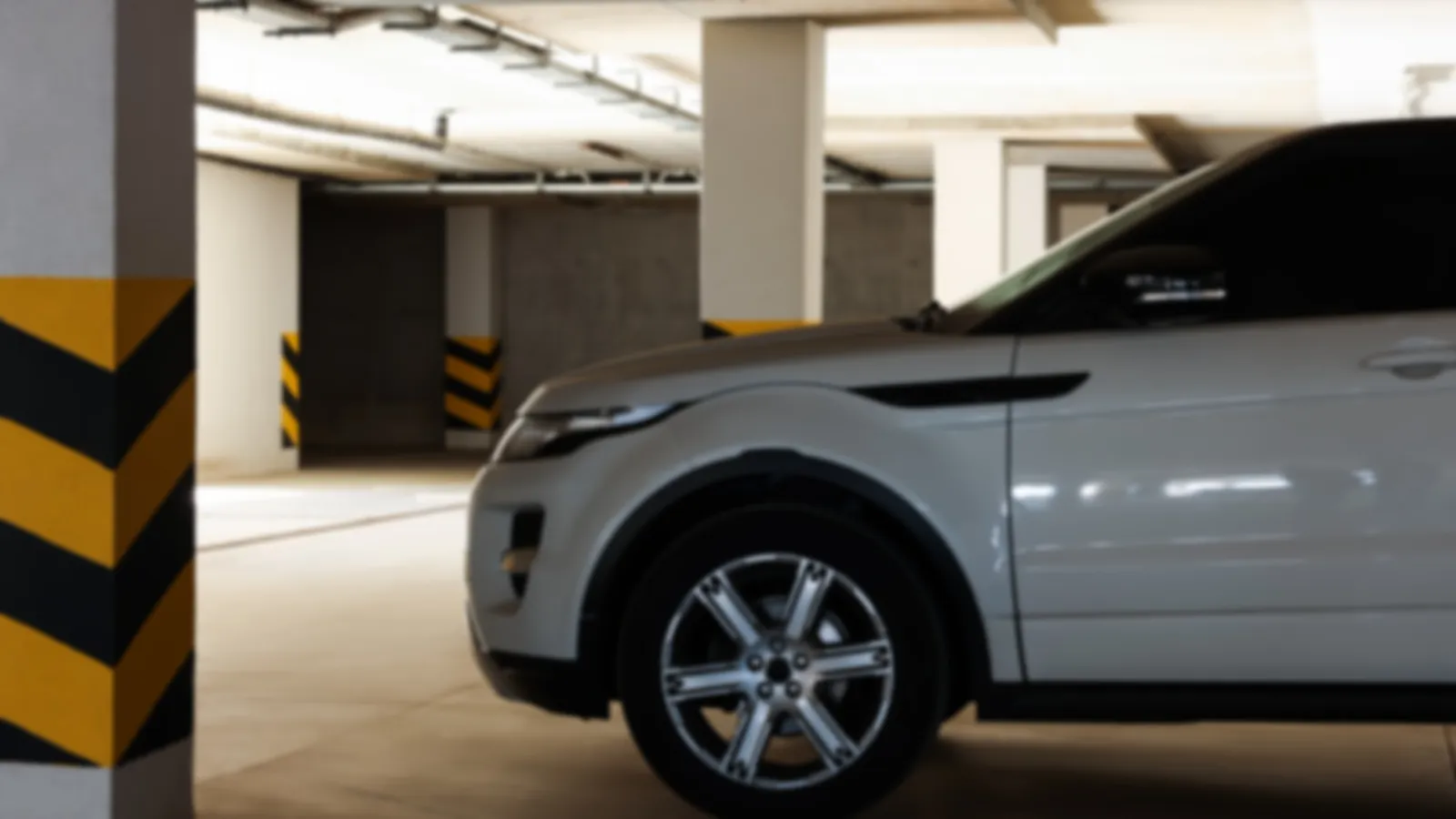 a silver car parked in a garage