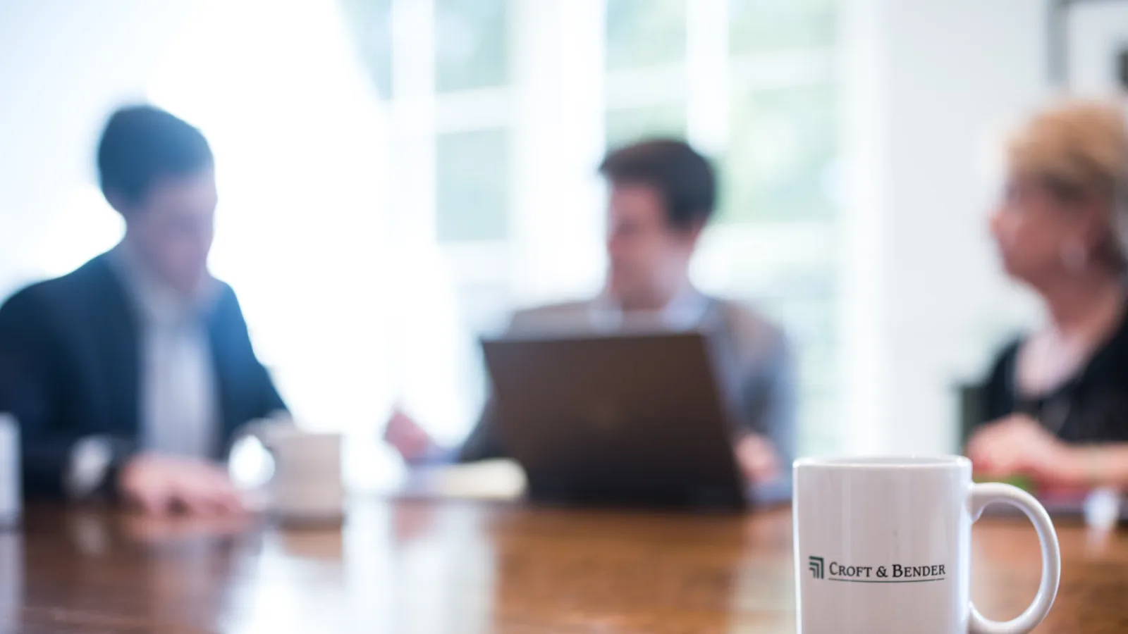 a few people sitting at a table