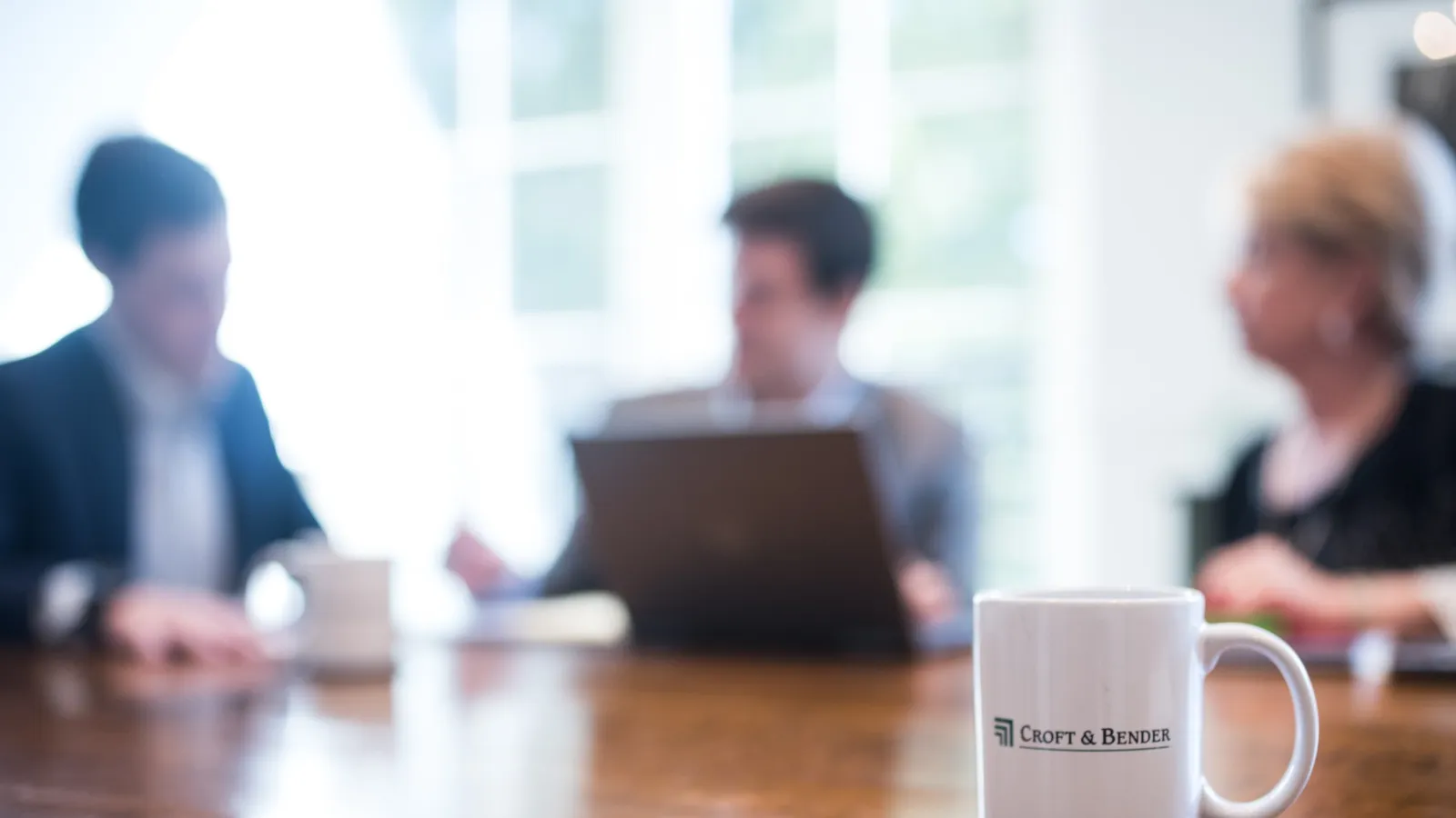 a few people sitting at a table