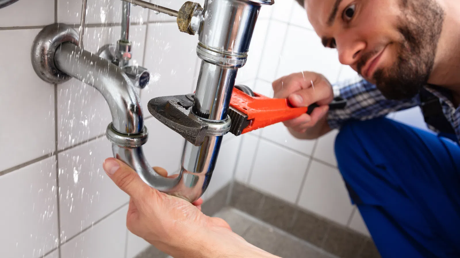 a person using a faucet