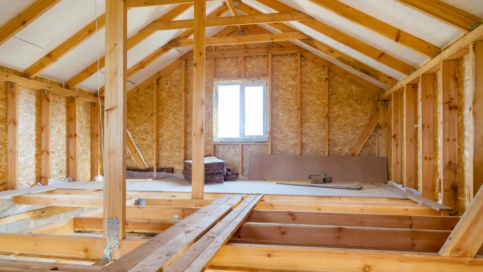 a wooden room with a window