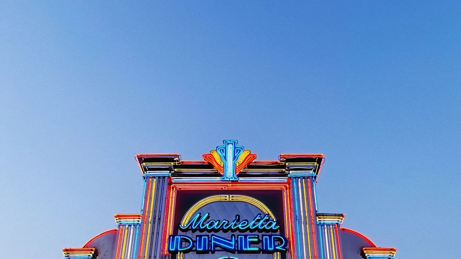 a colorful building with a sign on it
