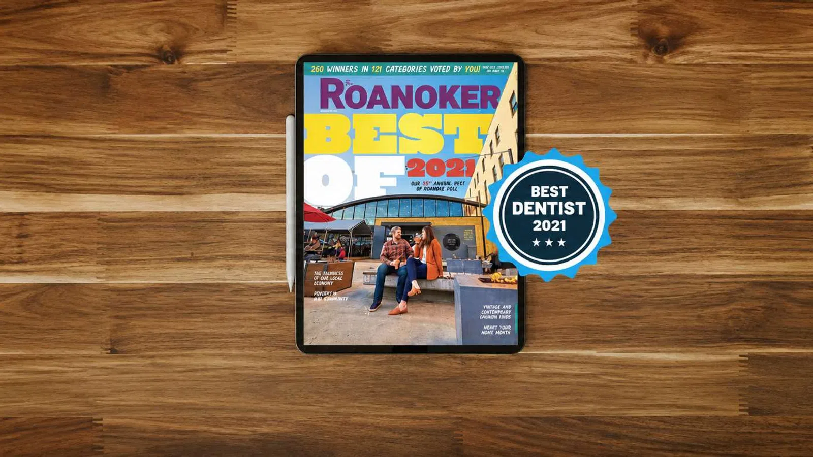 Tablet displaying Roanoker's Best of 2021 with blue badge for best dentist on wooden surface