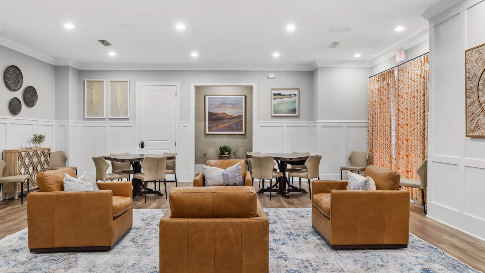 a large living room with a large white door