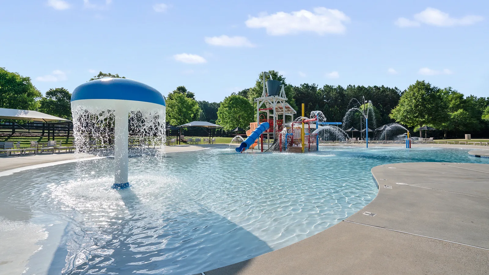 a water fountain in a pool