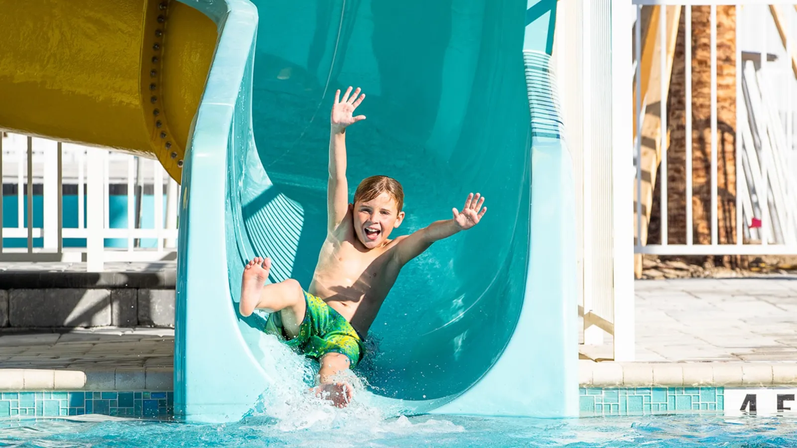 a person jumping into a pool