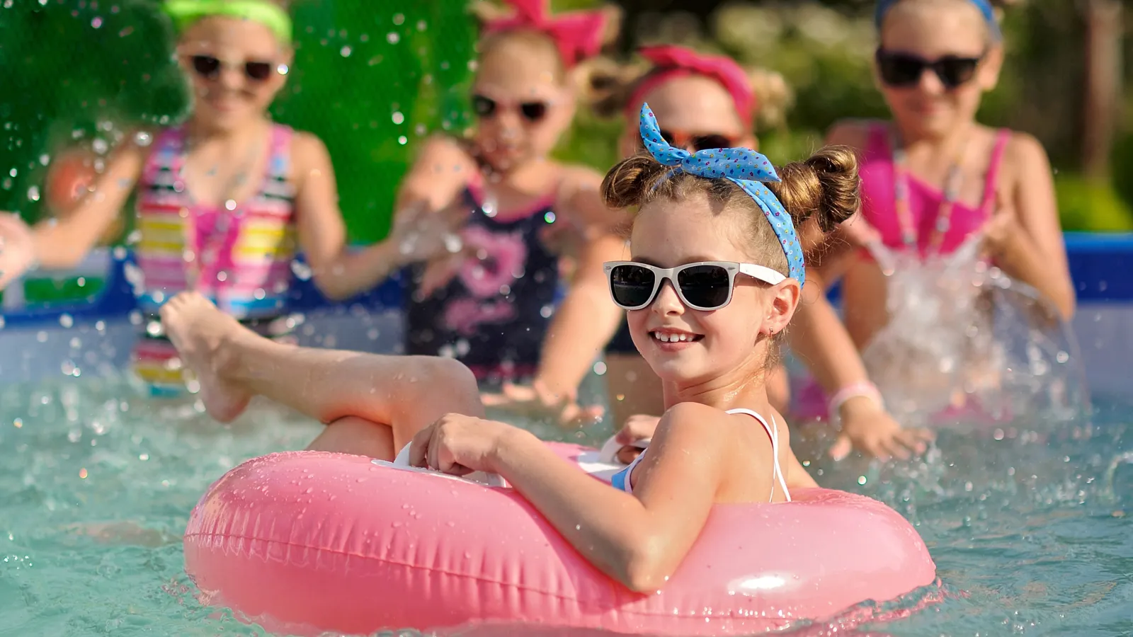 a group of girls in a pool