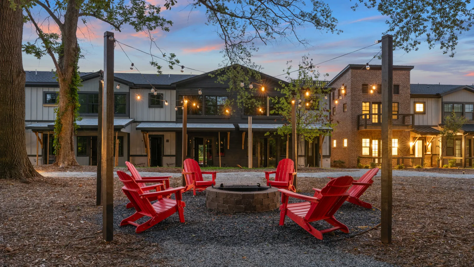 a building with a few chairs outside