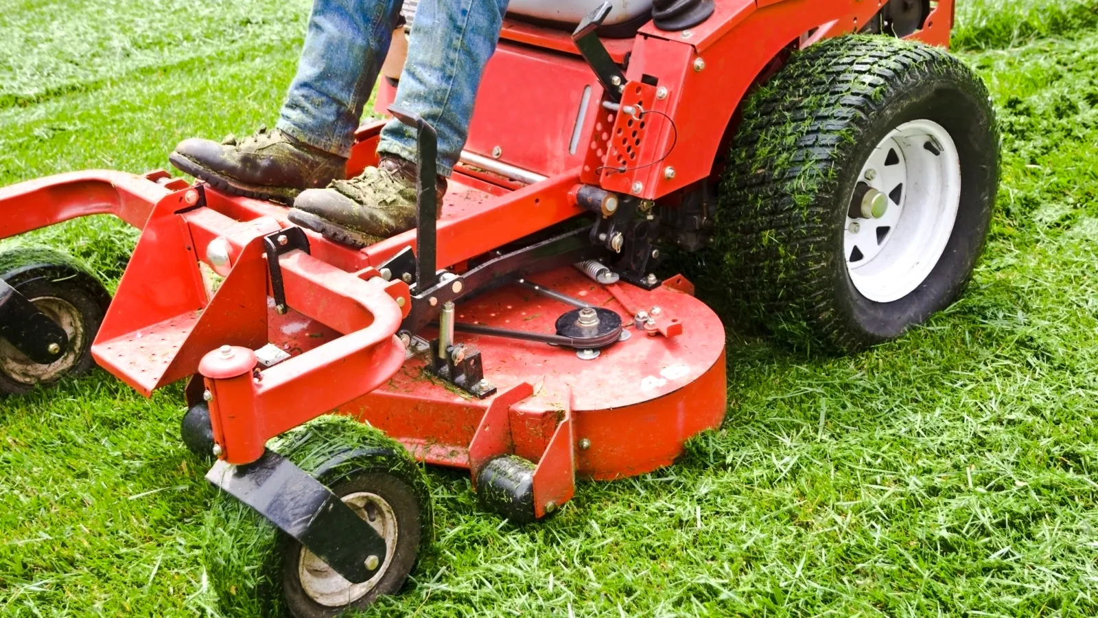 a person on a red tractor