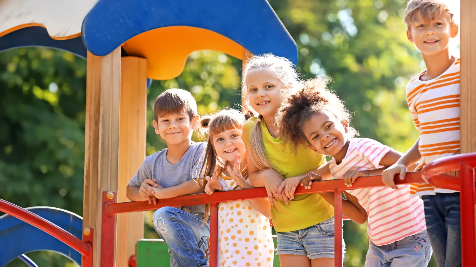 a group of children posing for a photo