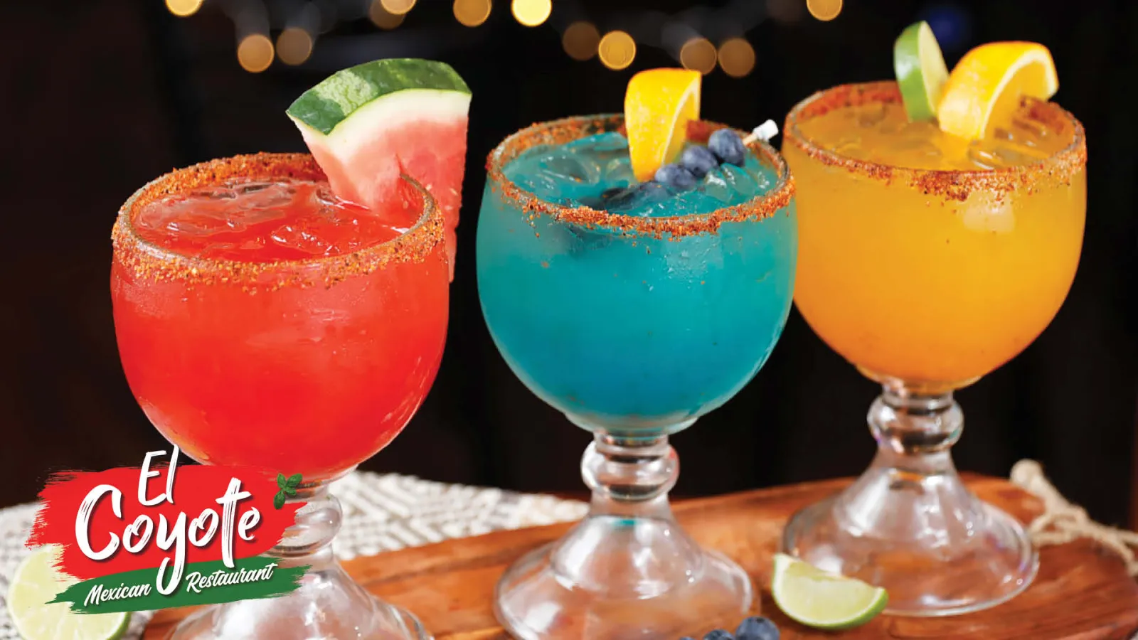 a group of colorful glasses with liquid in them