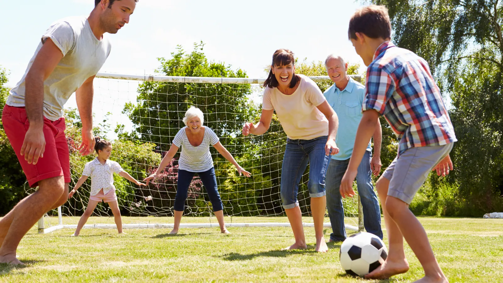 a group of people playing football