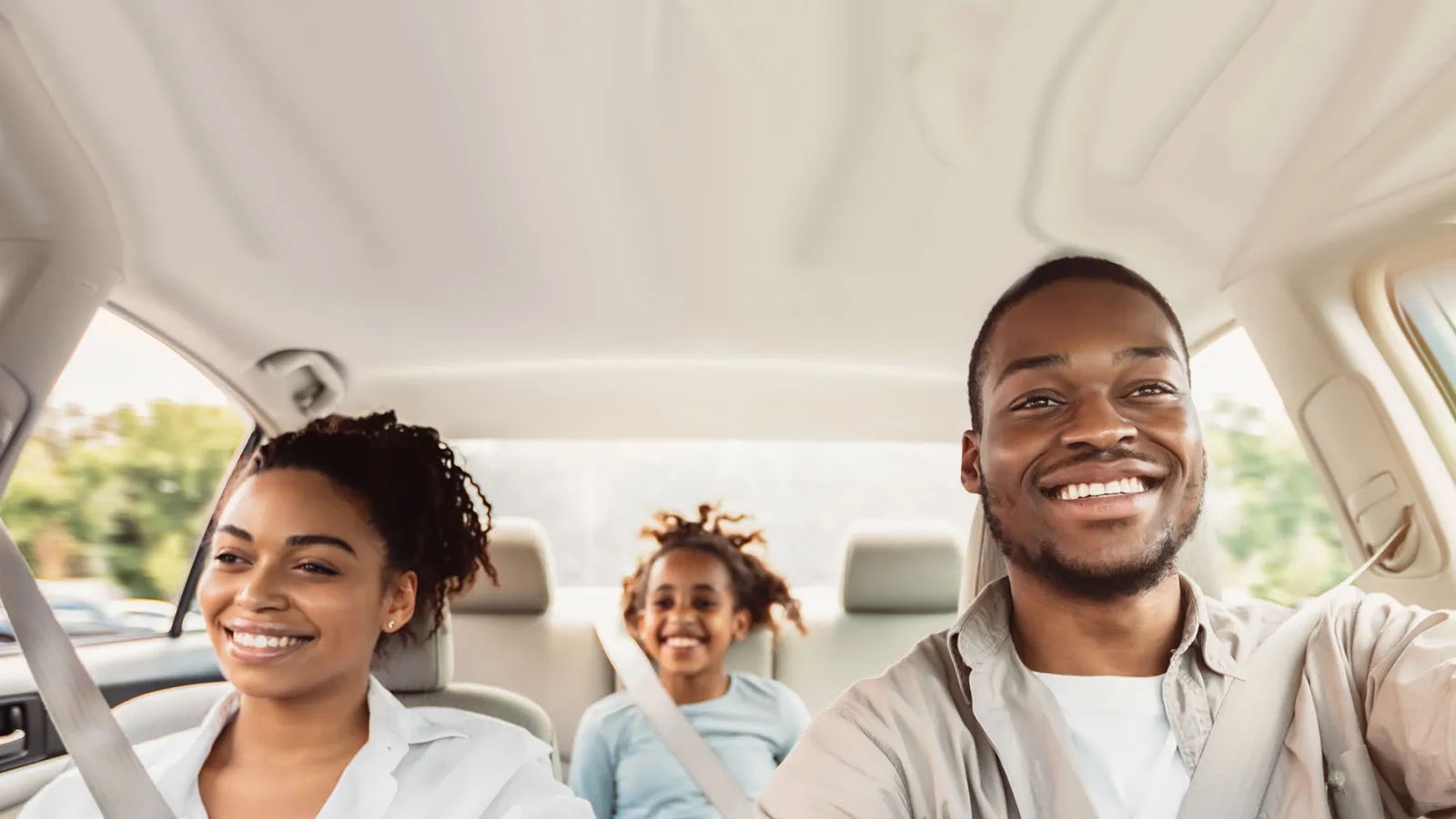 a man and a woman in a car