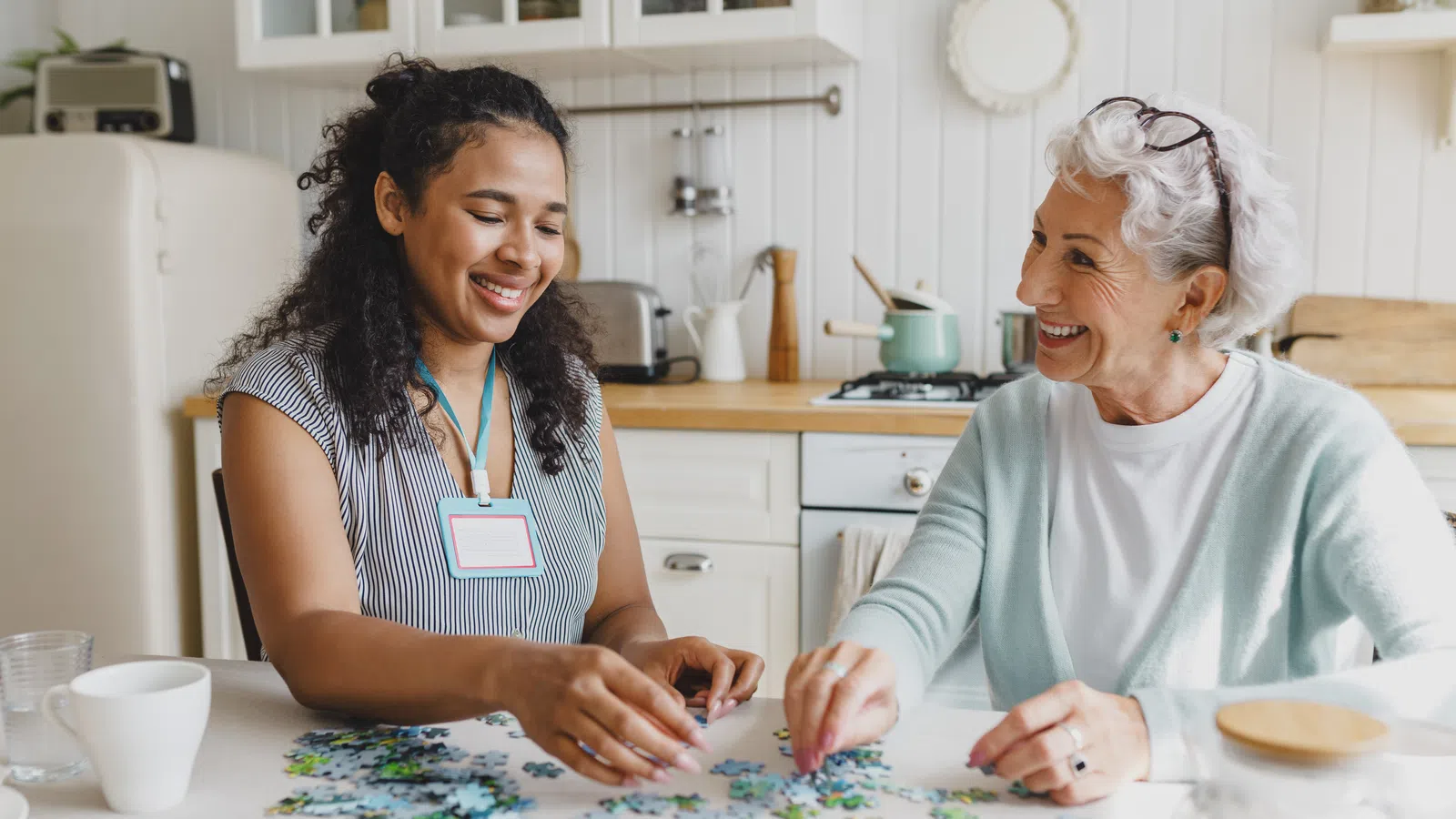 a couple of women sitting at a table