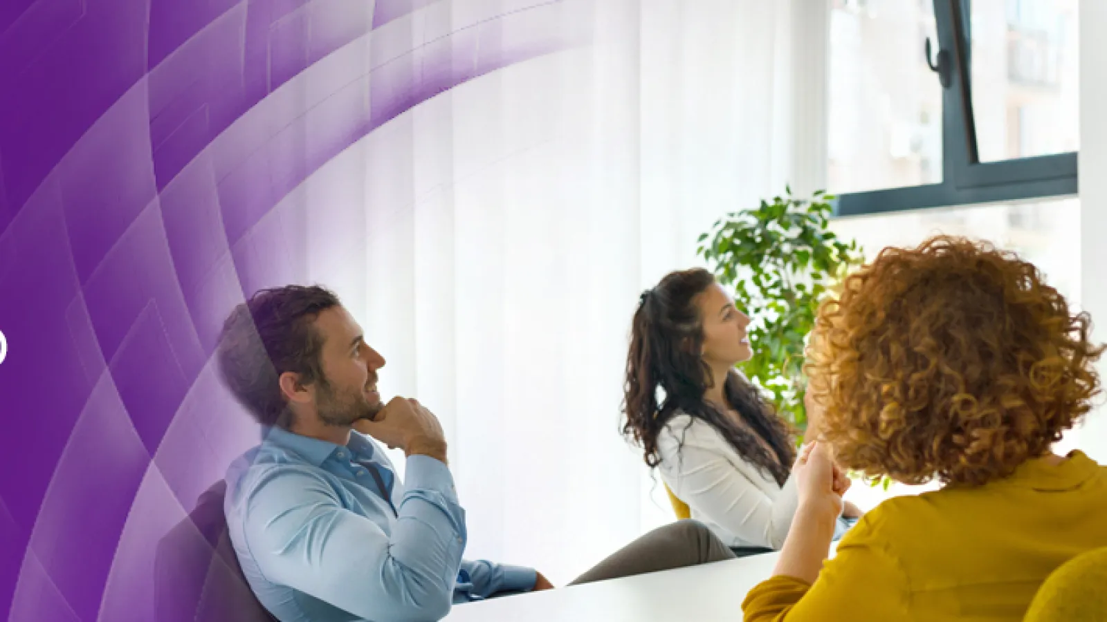 a group of people sitting in a room watching a television
