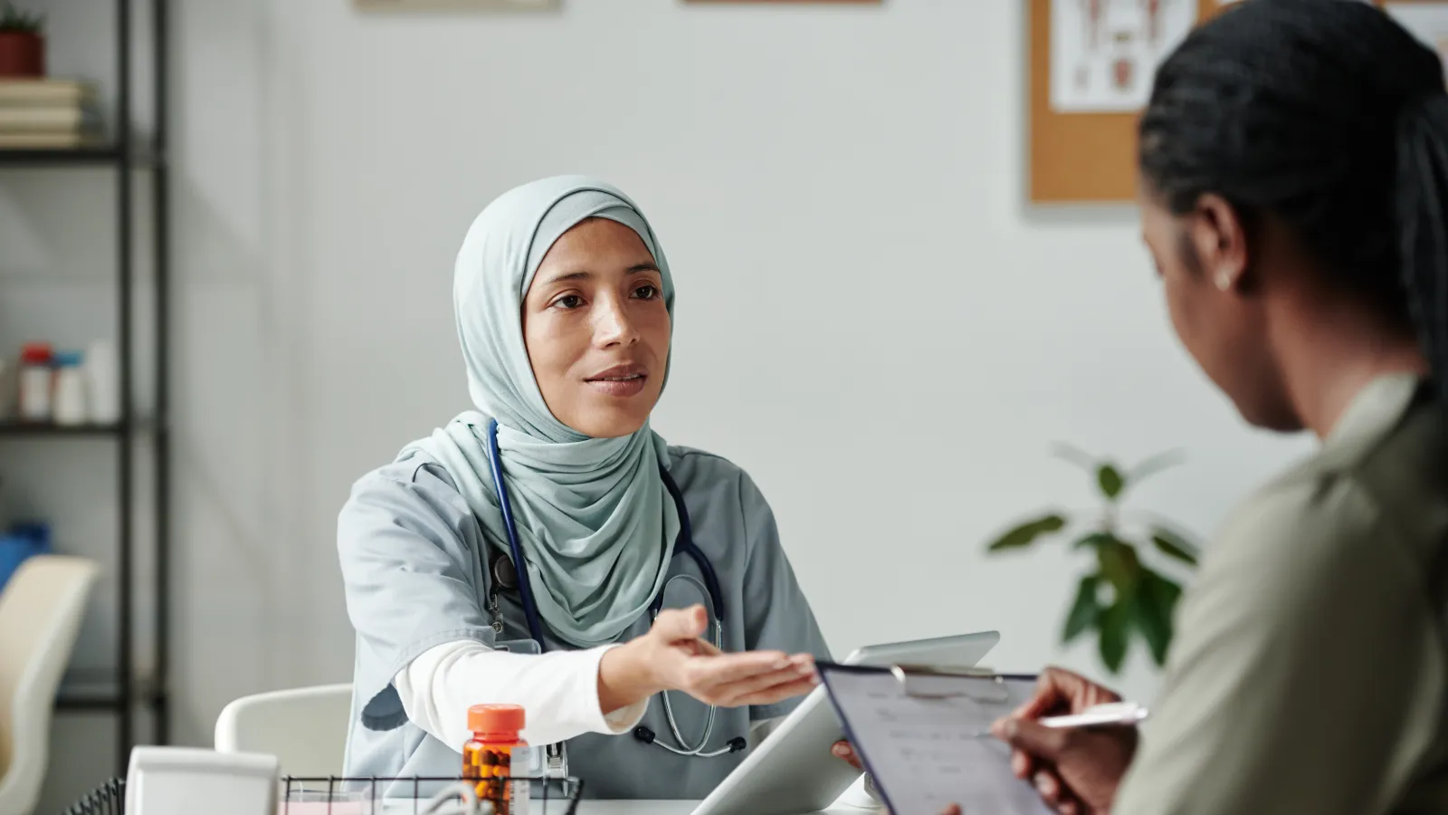 a doctor talking to a patient