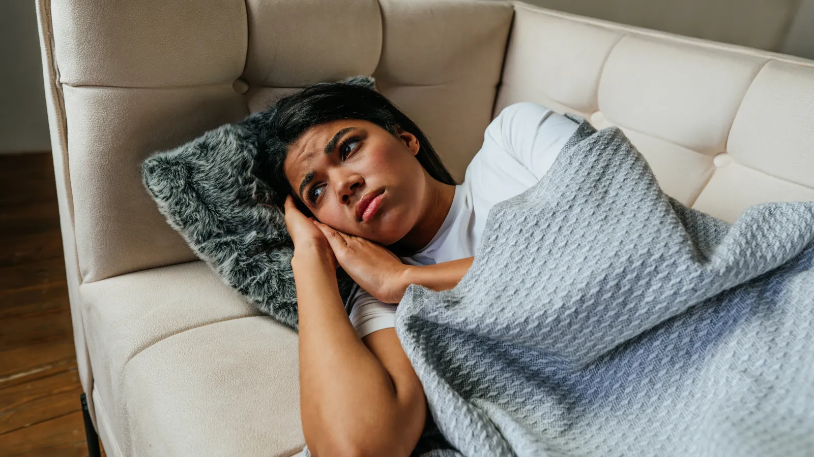 a person lying on a couch