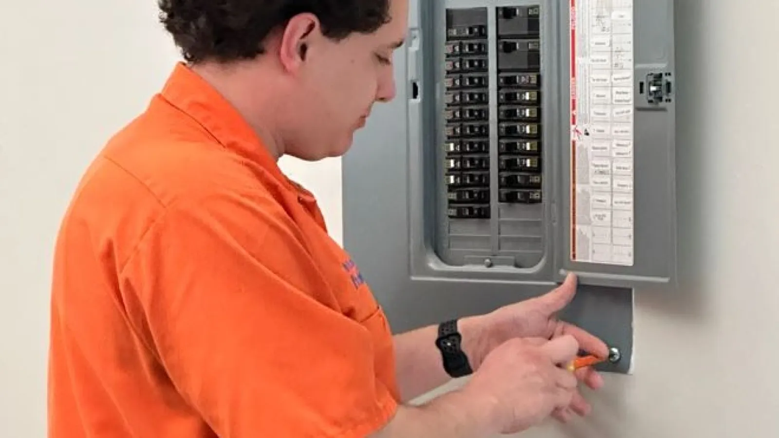 Estes Electrician working on an Electrical Panel