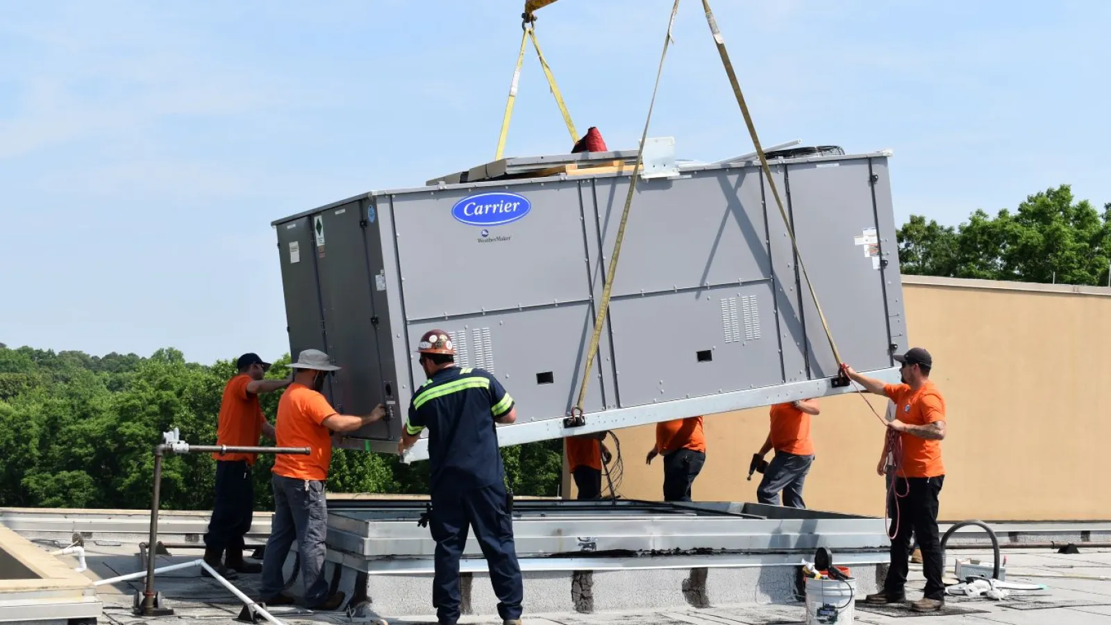 Estes Commercial Services with a roof AC unit