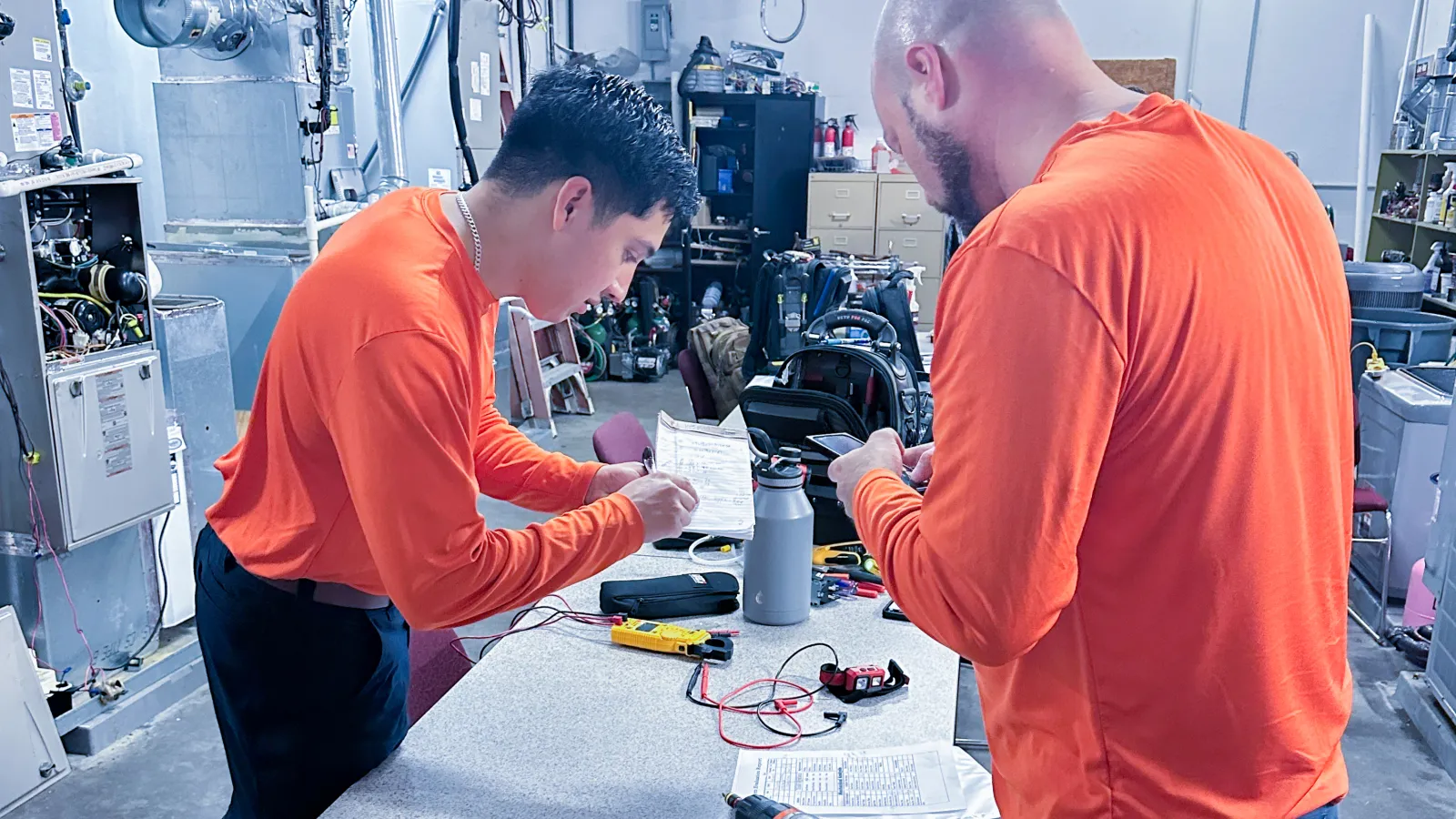 Estes Tech Builder Program. Estes technicians in a Lab
