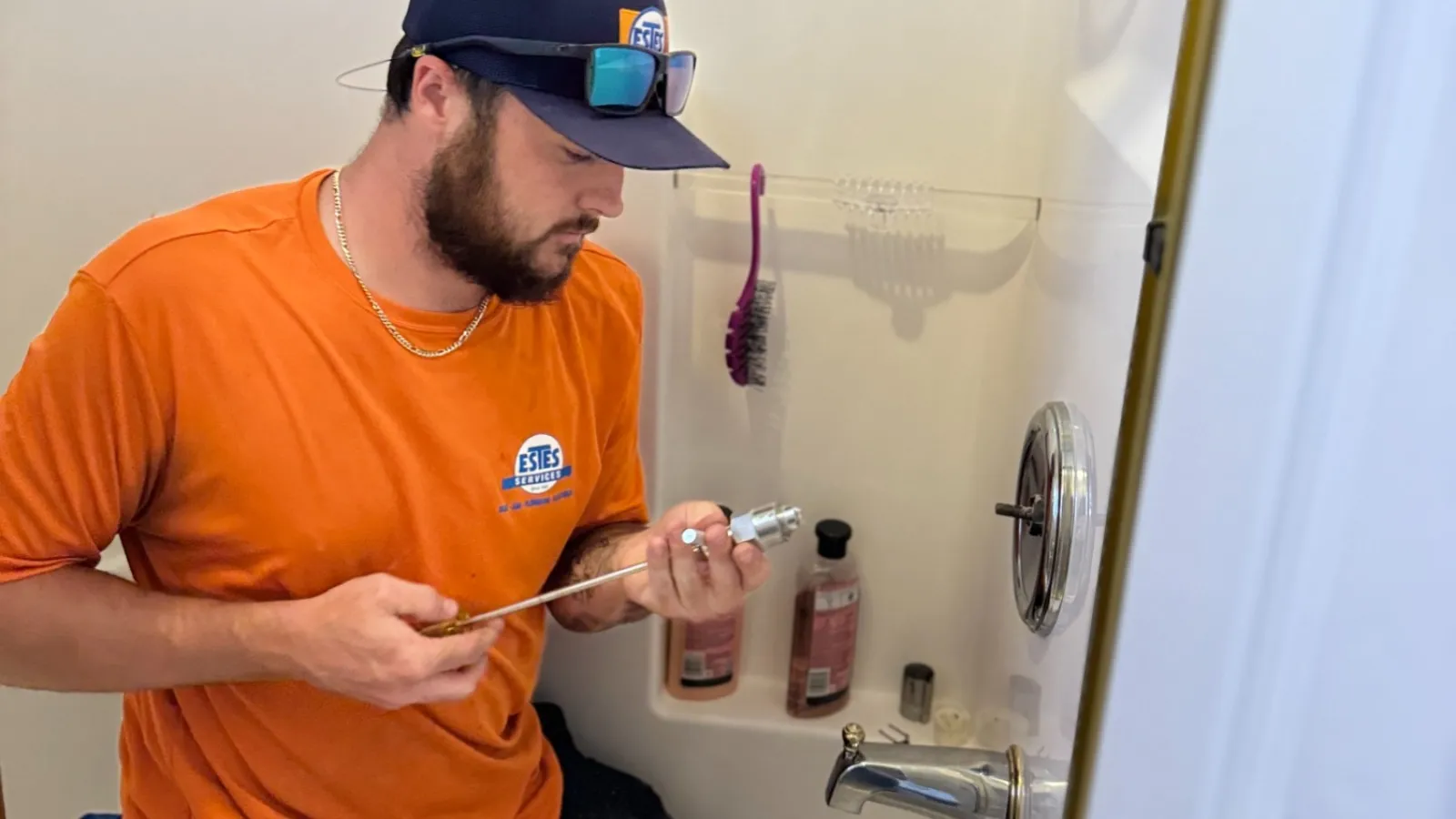 Estes Plumber installing bathroom fixtures