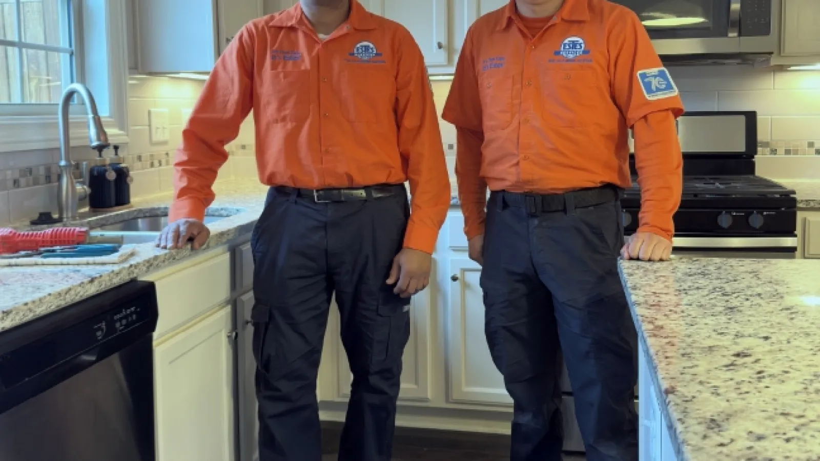 Two Estes Plumbers in a Kitchen
