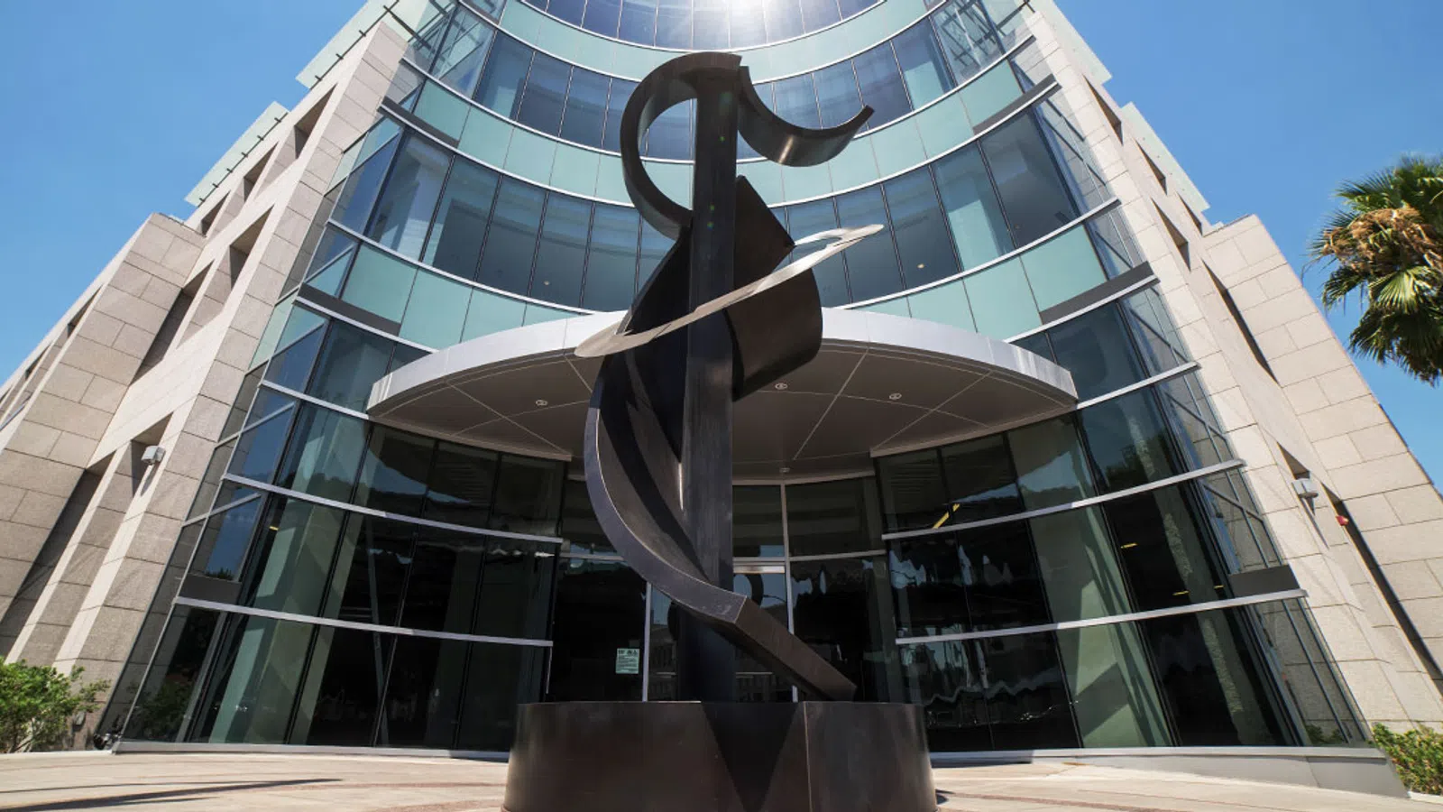 a statue in front of a building