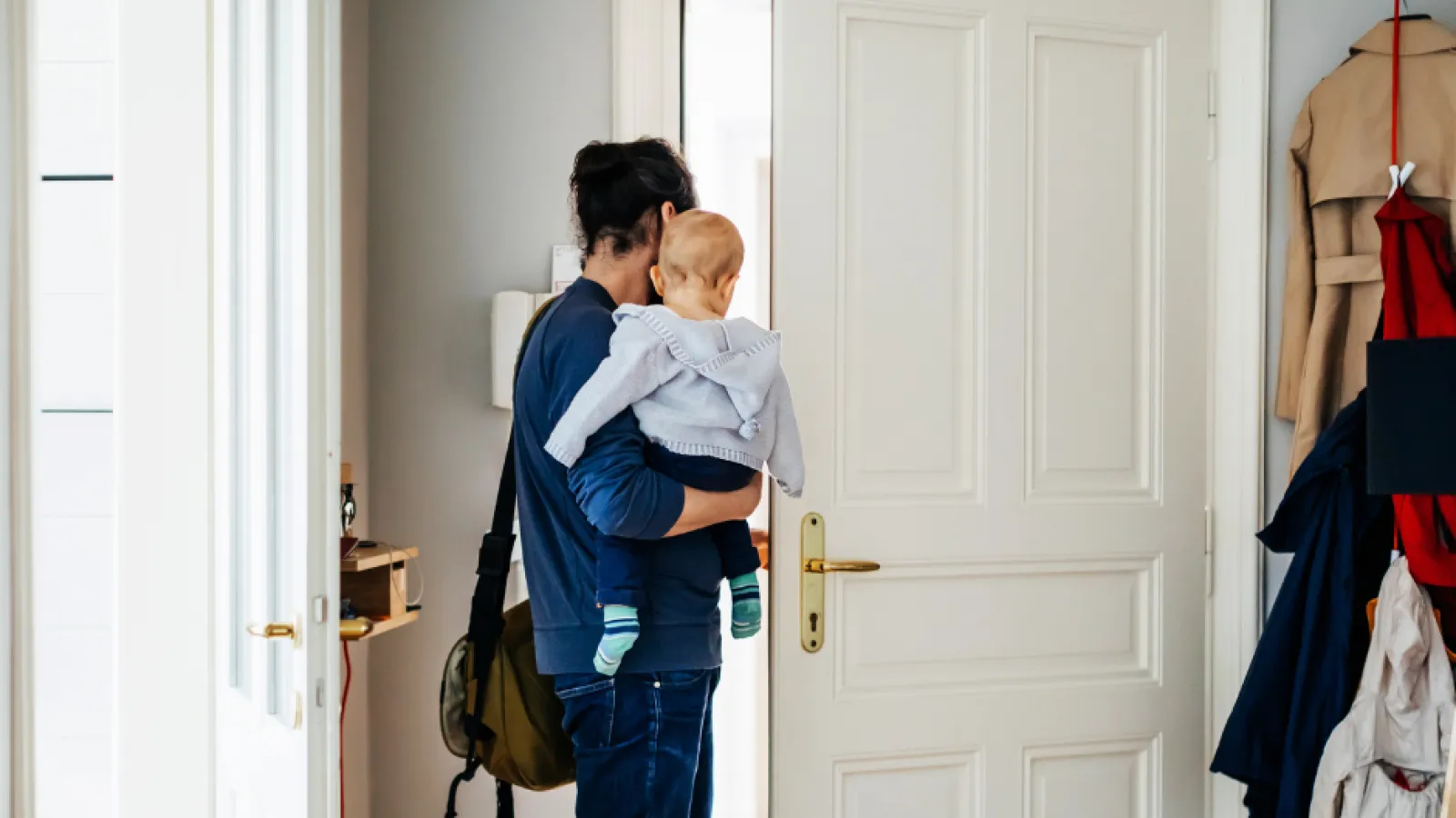 a person holding a baby