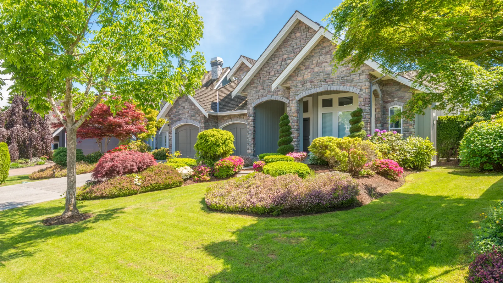 a large house with a large front yard and a large front yard