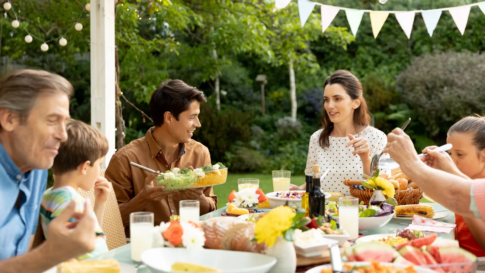 a group of people eating at a table