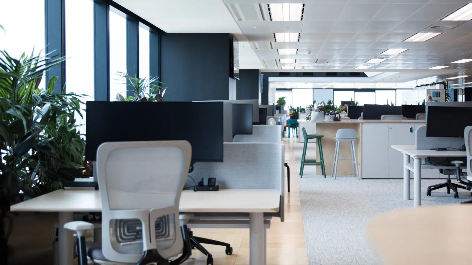 an office with white chairs