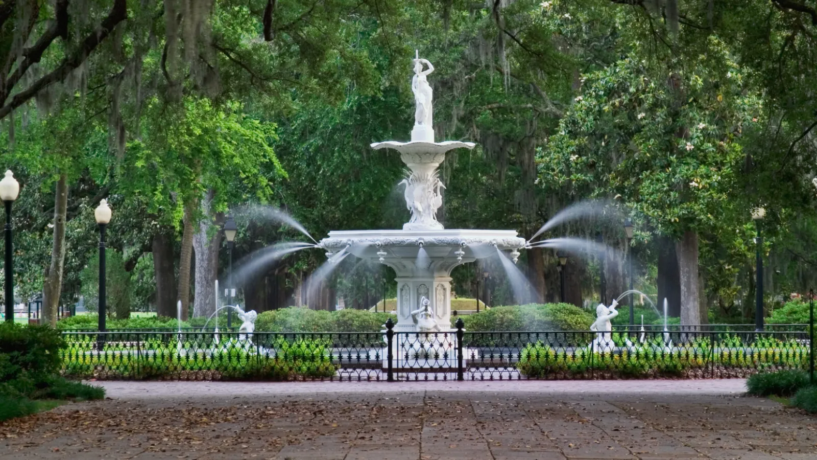 a fountain with a statue in the middle