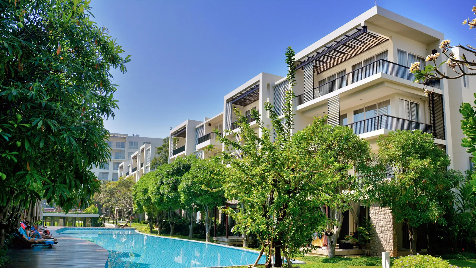 a pool in front of a building