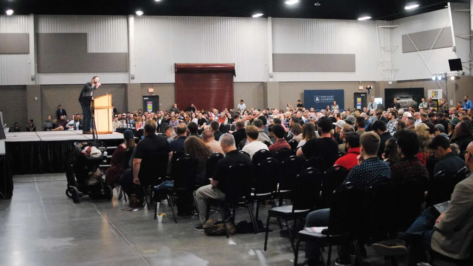 a person giving a presentation to an audience