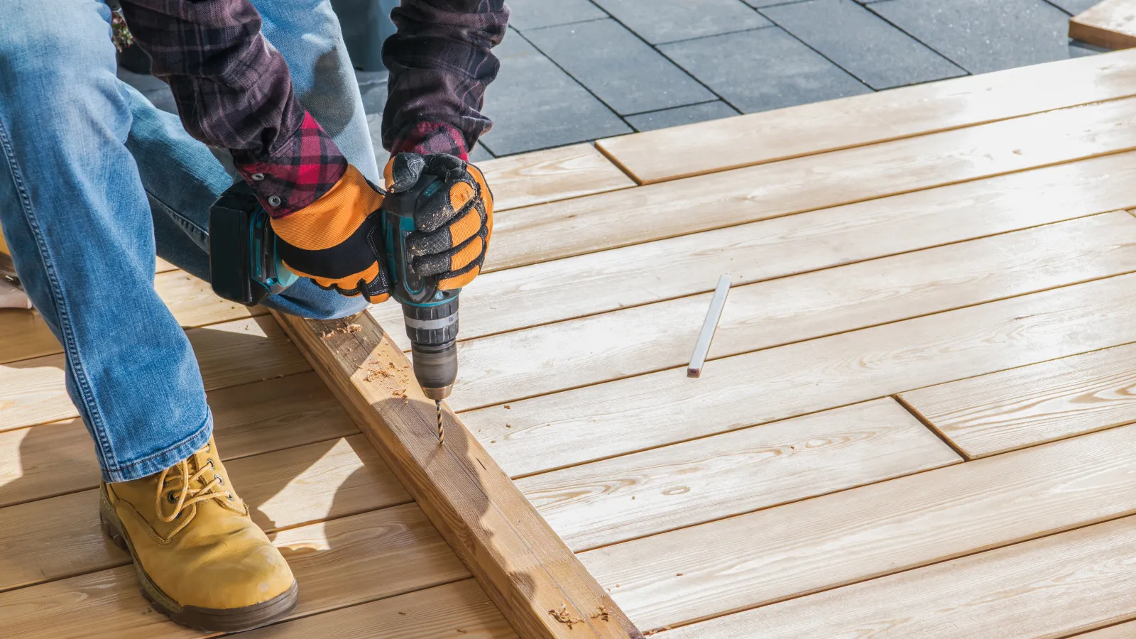 a person's legs on a wooden  deck Mission to Serve