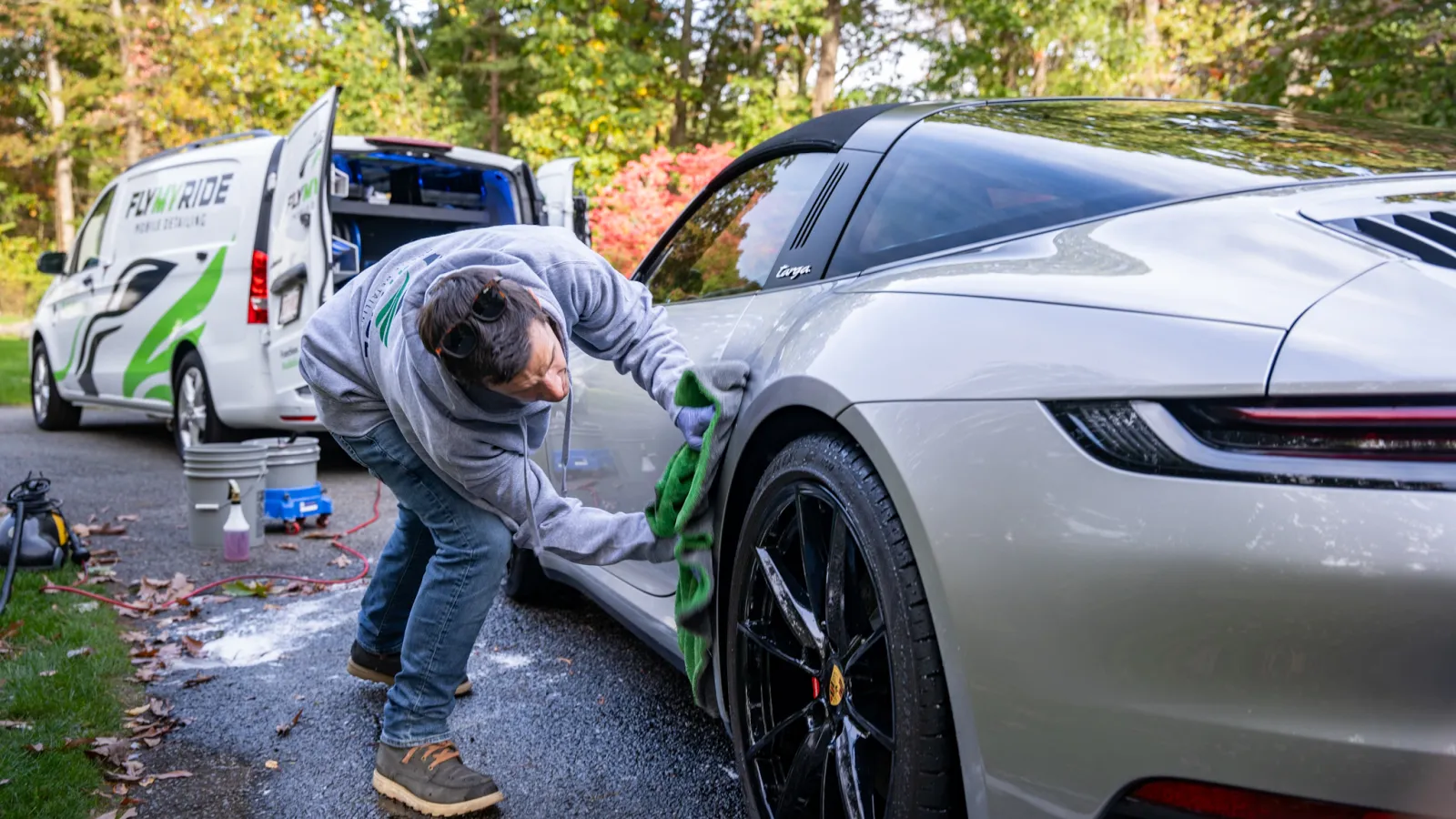 a man fixing a car