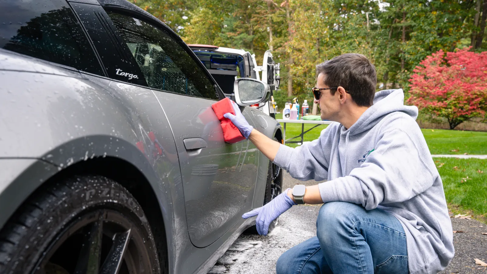 a person sitting on a car