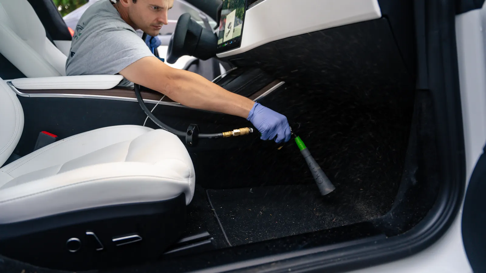 a person working on a car engine