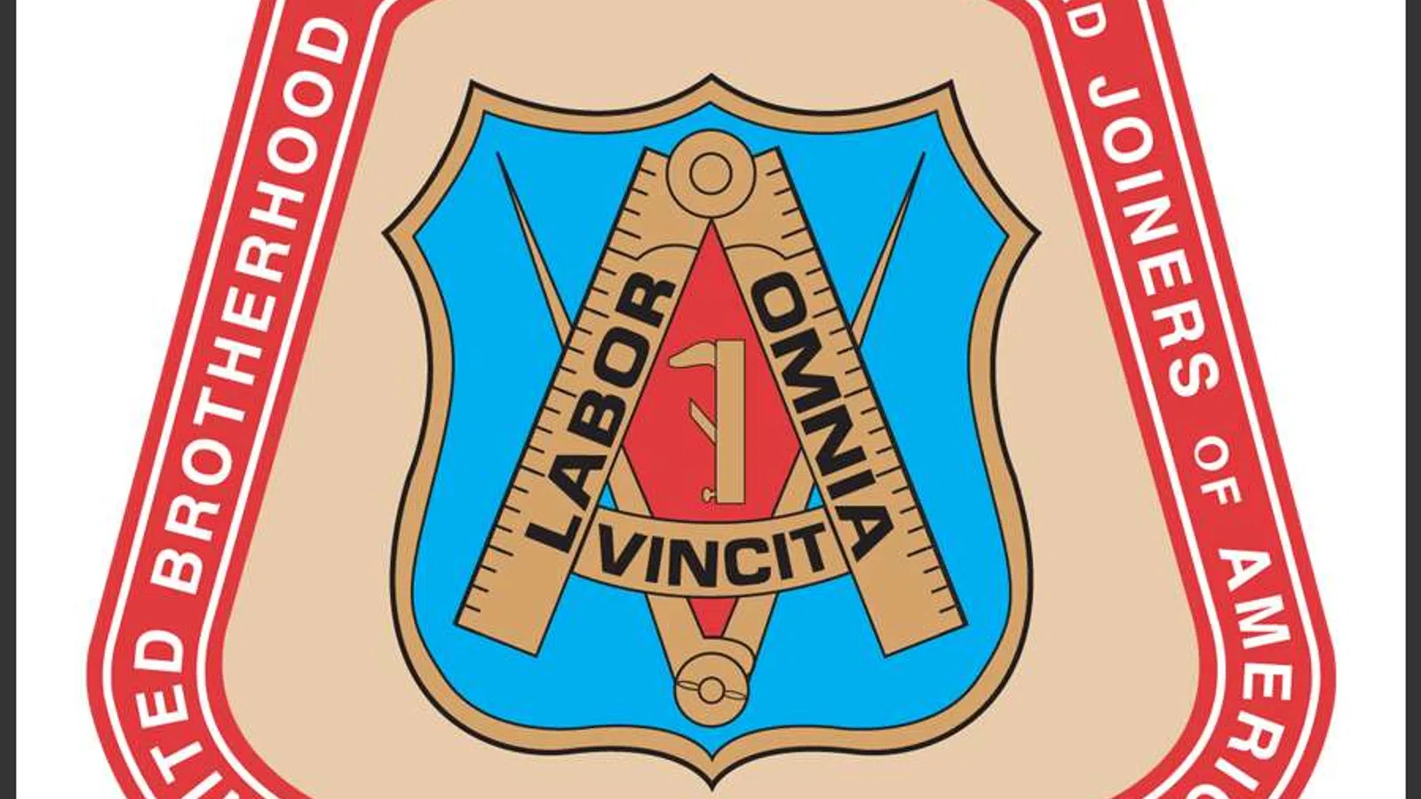 Emblem of the United Brotherhood of Carpenters and Joiners of America with tools and Latin motto Labor Omnia Vincit.
