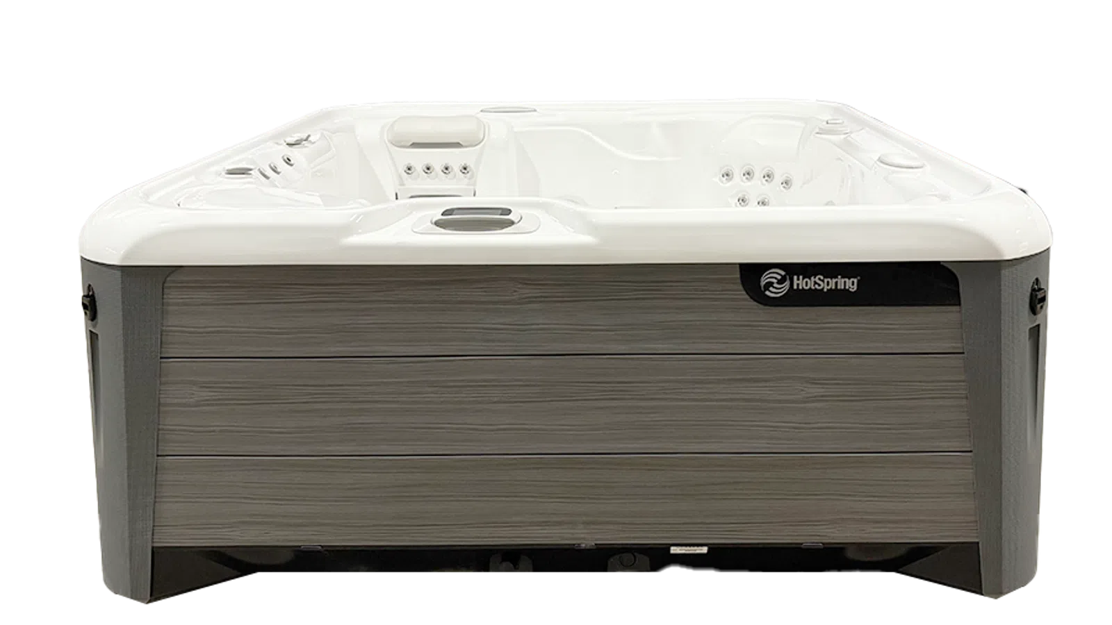 White HotSpring hot tub with gray wooden exterior panels and built-in seating jets